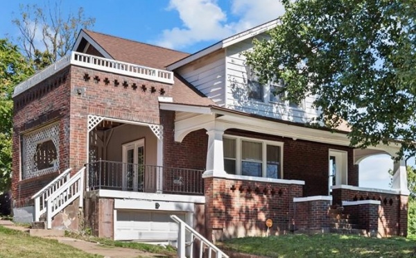 Charming family home in Boise, ID with a modern facade and spacious garage.