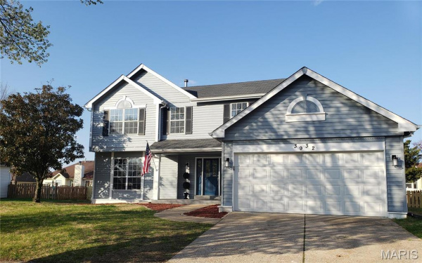 Charming family home in Boise, ID with a modern facade and spacious garage.