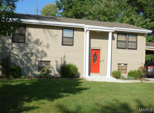 Charming family home in Boise, ID with a modern facade and spacious garage.