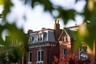 Tree-lined street in Benton Park St Louis Missouri with 19th century brick homes for sale near Cherokee Street zip code 63118